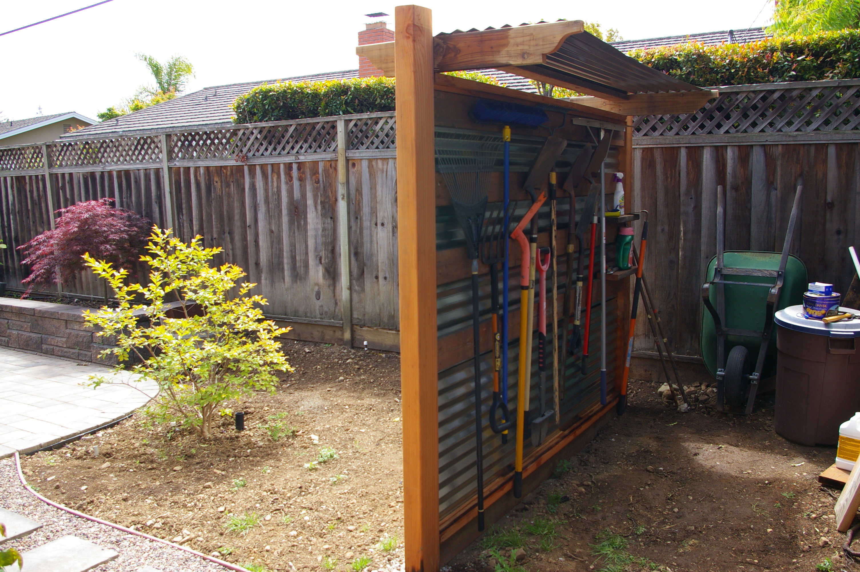 Backyard Landscaping: Corrugated Metal and Redwood Tool 